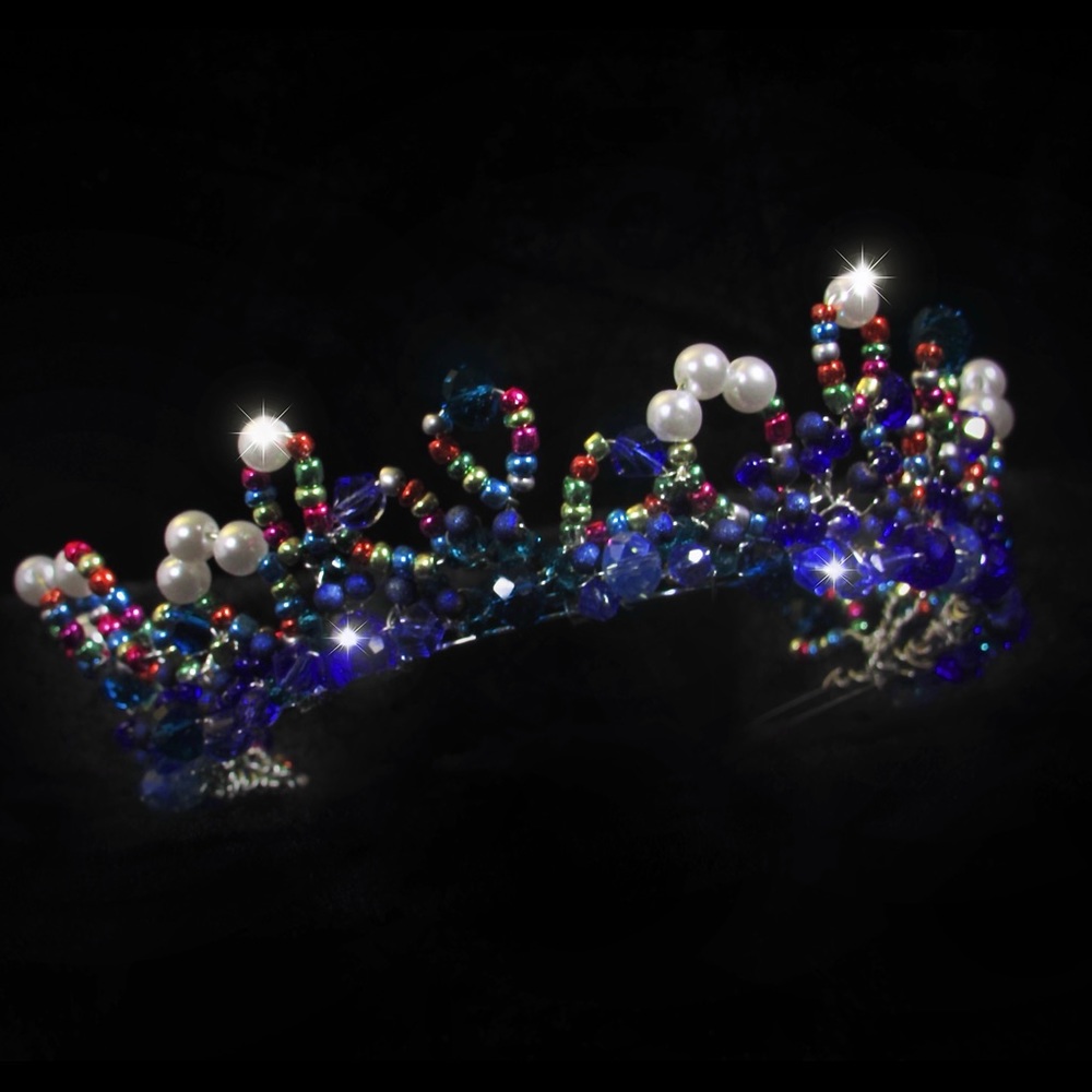 Handmade crown made of beads and stones. Perfect for any glamorous event.